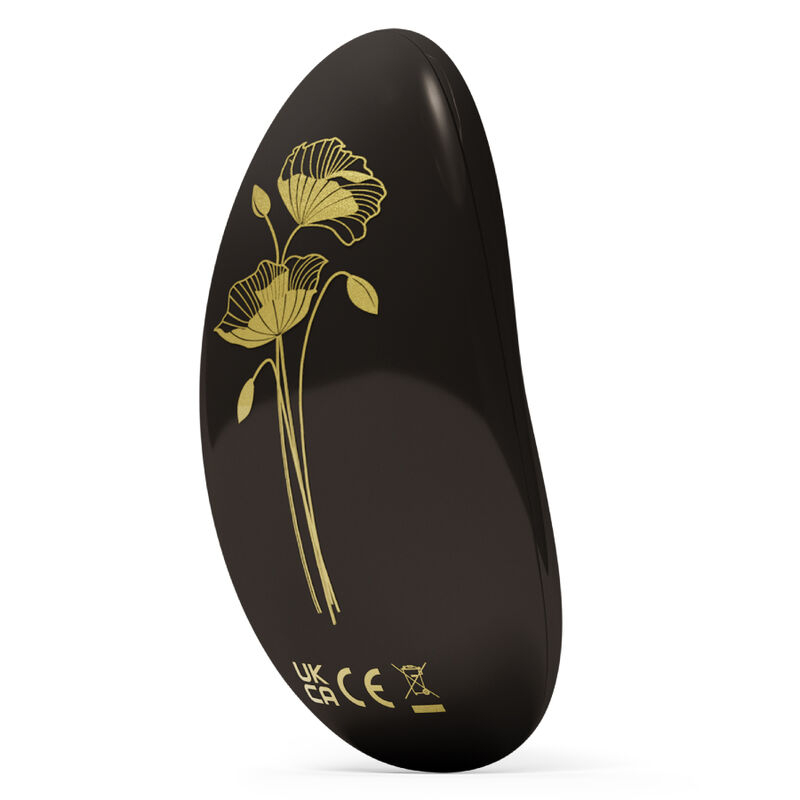 Black oval decorative plate with a gold flower illustration and safety marks along the edge.