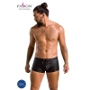 Male model wearing black leather-look boxer briefs in a studio setting; Passion logo visible in the top left corner.