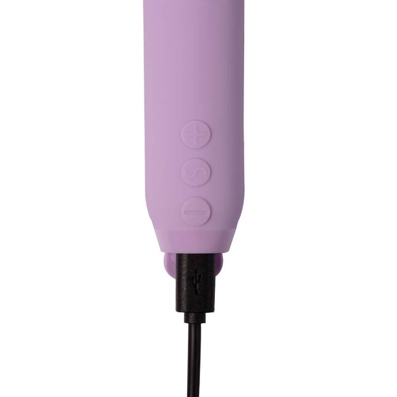 Close-up of a lavender USB-rechargeable handheld device with three raised control buttons (plus, S, minus) on the side and a USB cable attached.