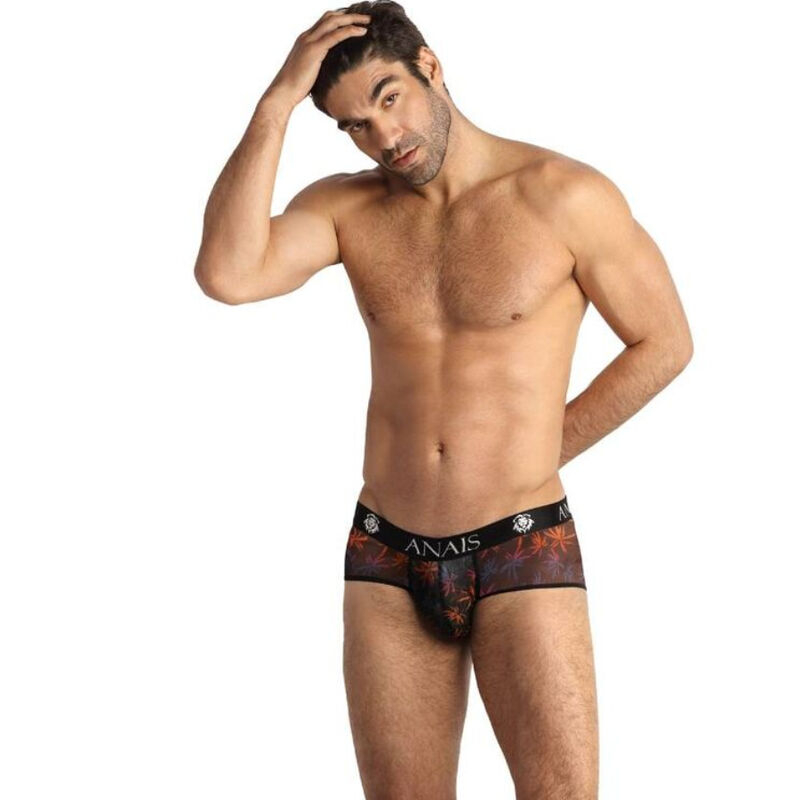 Man wearing black patterned underwear, posing with one hand on his head, brand waistband reads ANAÏS.