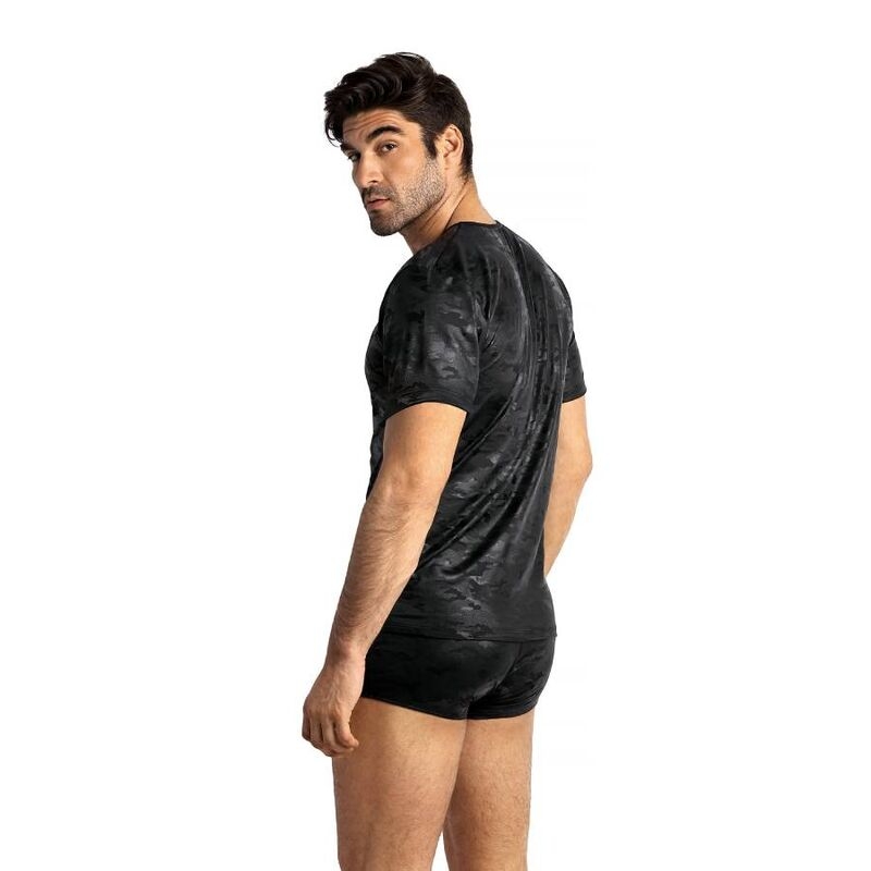 Man in a dark camouflage T-shirt and matching shorts, shown from the back with a slight angle.