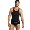 Male model wearing a black sleeveless tank top and black boxer briefs, smiling at the camera.