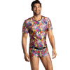 Man modeling a matching colorful pop-art underwear set (t-shirt and boxers) with a black waistband reading ANAIS, smiling.