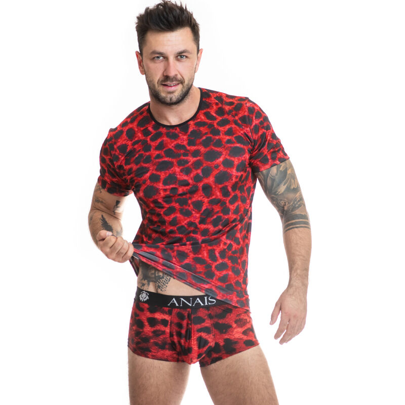 Model wearing a red leopard-print underwear set (T-shirt and boxer briefs) by Anais; waistband shows brand name Anais as he lifts the shirt slightly.