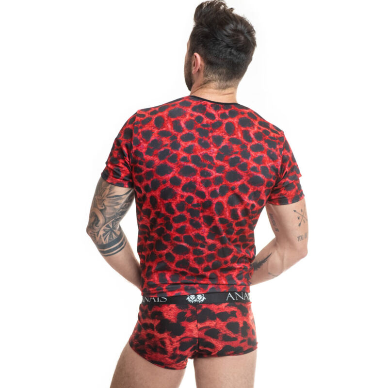 Back view of a man wearing a red and black leopard-print underwear set with a black waistband showing brand text and tattoos on his arms, against a white background.