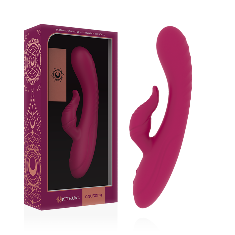 Pink silicone sex toy with curved shaft and a separate smaller stimulator, displayed beside its purple product box packaging.