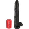 Black silicone sex toy (dildo) standing upright on a white background next to a red Pipedream can for scale.