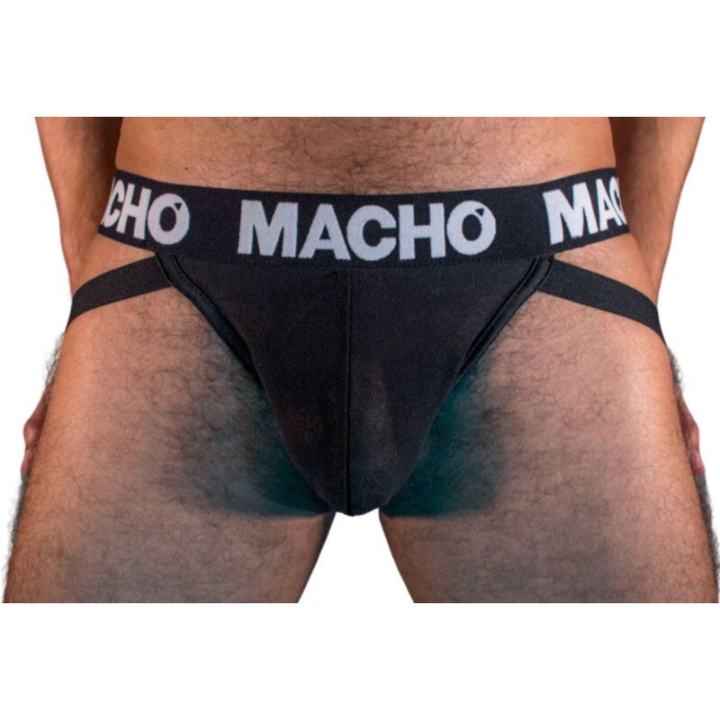 Man's lower torso wearing black briefs with a wide waistband reading 'MACHO'.