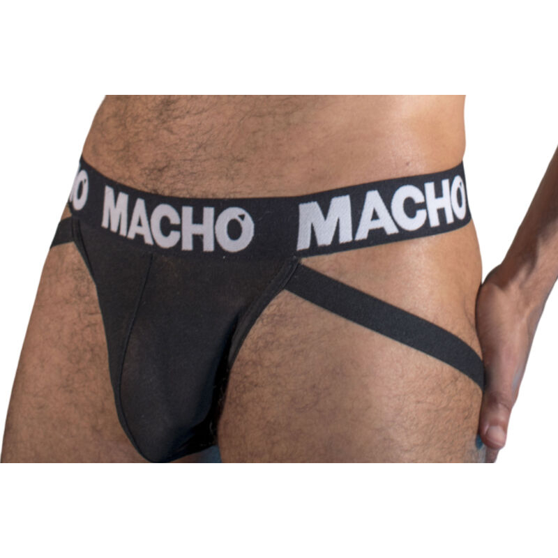 Men's black briefs with a bold 'MACHO' waistband and attached side strap harness.