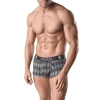 Muscular man wearing gray plaid boxer briefs with a black waistband that reads ANAIS, shirtless from the waist up.