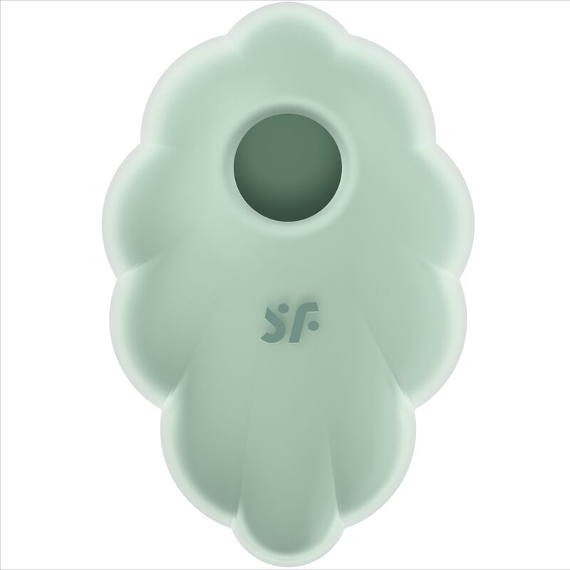 Mint-green leaf-shaped silicone object with a round central hole and a subtle logo on the front, likely a decorative or functional accessory