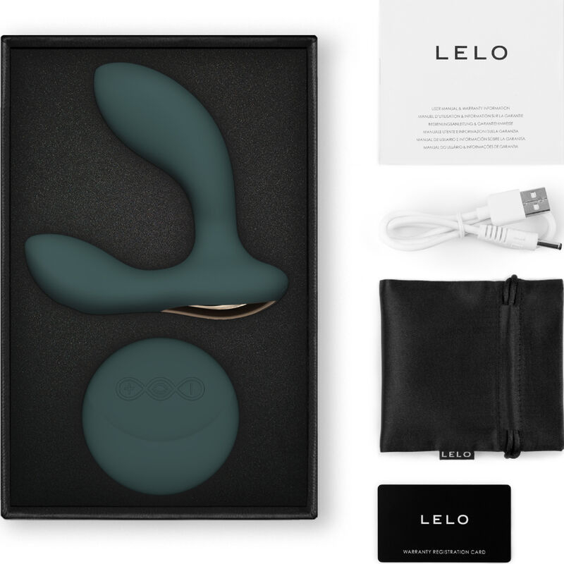 Green silicone G-spot vibrator in an open LELO gift box with charging dock, USB cable, black storage pouch, warranty card, and manual labeled LELO.