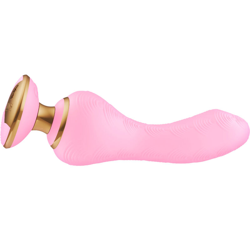 Pink silicone vibrator with a gold-toned base and textured surface, shown laying horizontally.