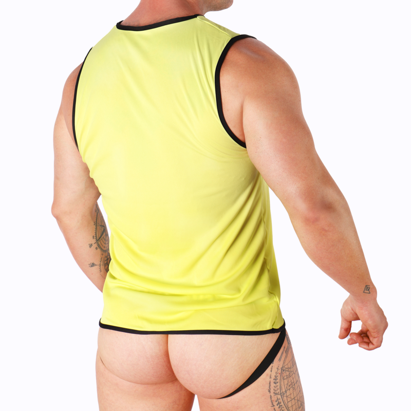Back view of a man in a neon yellow sleeveless top with black trim, exposing a black thong and tattooed arms.