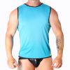 Man wearing a bright blue sleeveless athletic shirt with black trim and black swim briefs; visible tattoos on arms.