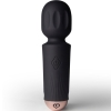 Black silicone vibrator with rounded head and power button on the shaft, standing upright on a white surface.