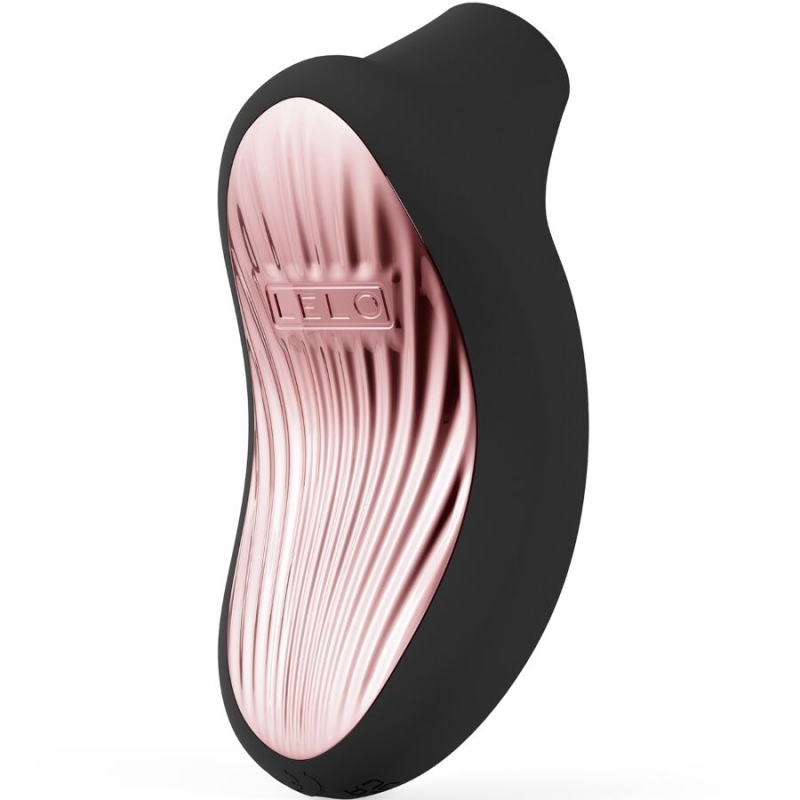 Rose-gold ribbed vibrator enclosed in a black ergonomic housing, product photograph.
