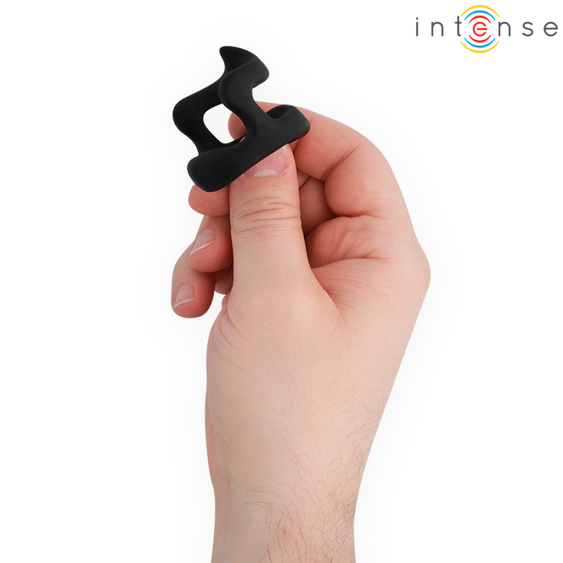 Hand holding a small black silicone ring with curved openings (intense logo in corner).