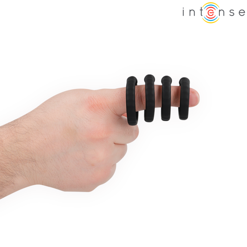 Hand holding a black four-loop finger resistance exerciser wrapped around a finger for grip strength training