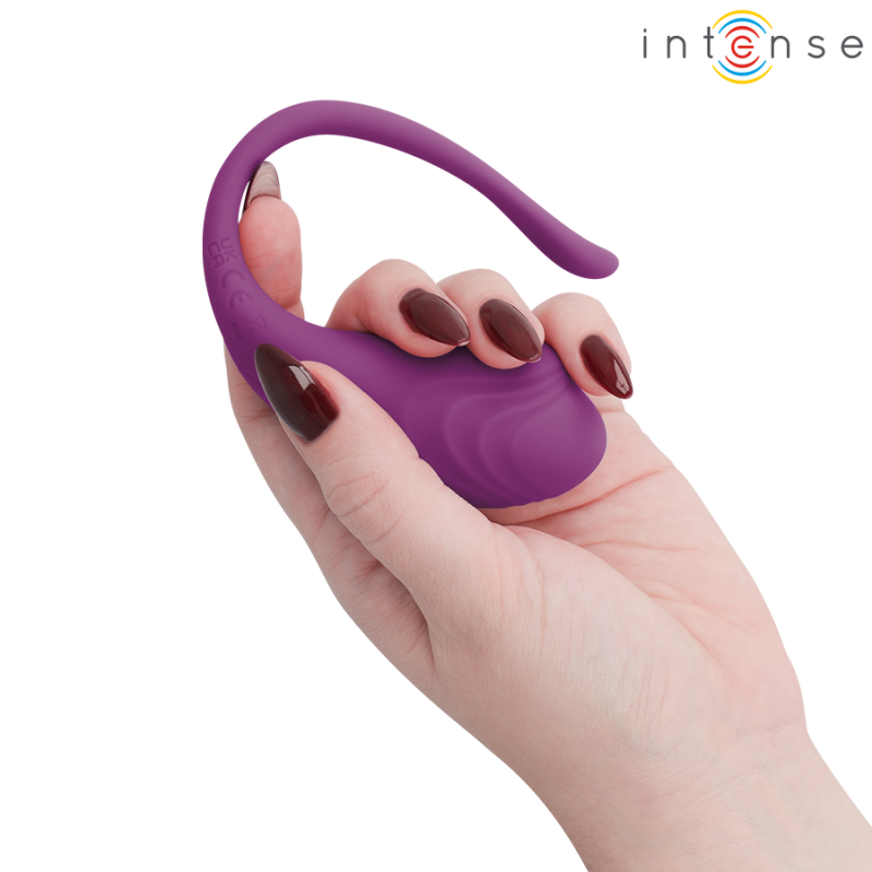 img_221439_e843ebe58f58d2c383e0c58a11670777_1png - Sex Shop | Lodia.gr - 100% Διακριτική Και Παράδοση με courier της επιλογή σας Purple silicone kegel toy with curved handle being held in a hand against a white background (Intense logo in corner).
