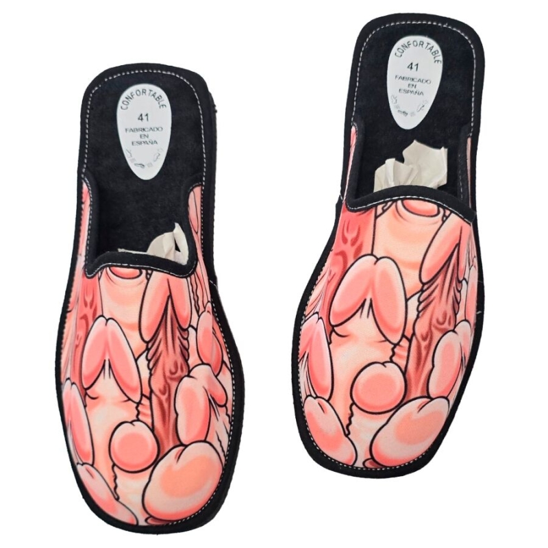 Pair of pink slip-on house slippers featuring a bold cartoon anatomy design of internal organs on the upper surface.