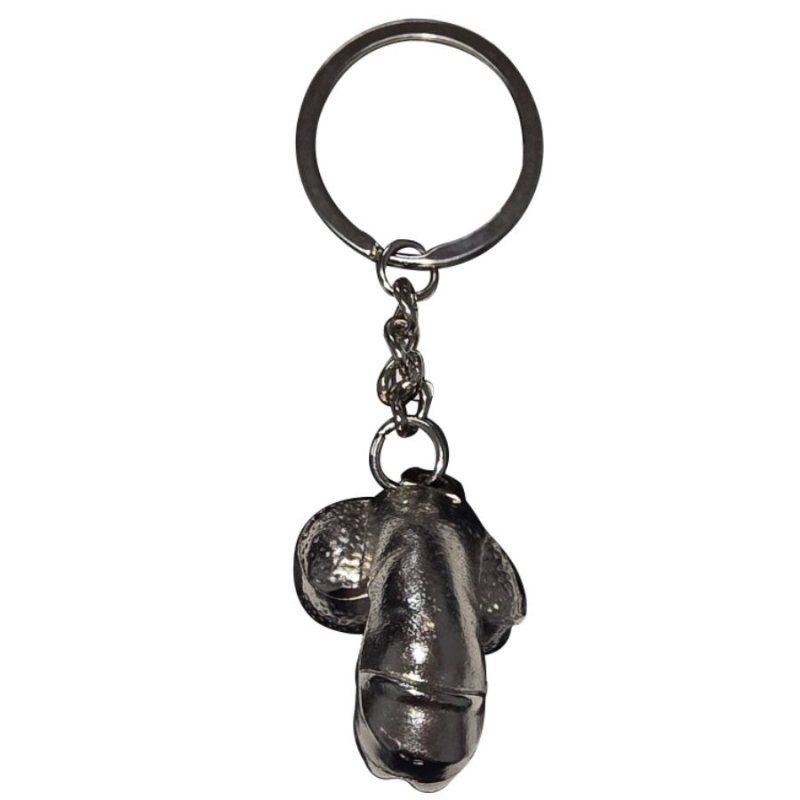 Metal keychain with a small dark chrome boxing glove charm hanging from a chain and ring surface.
