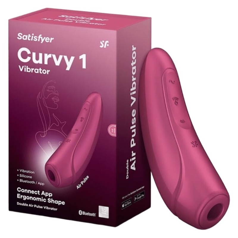 Pink Curvy 1 vibrator next to its purple packaging, with ergonomic design and control buttons visible on the device and box text like 'Satisfyer Curvy 1'.