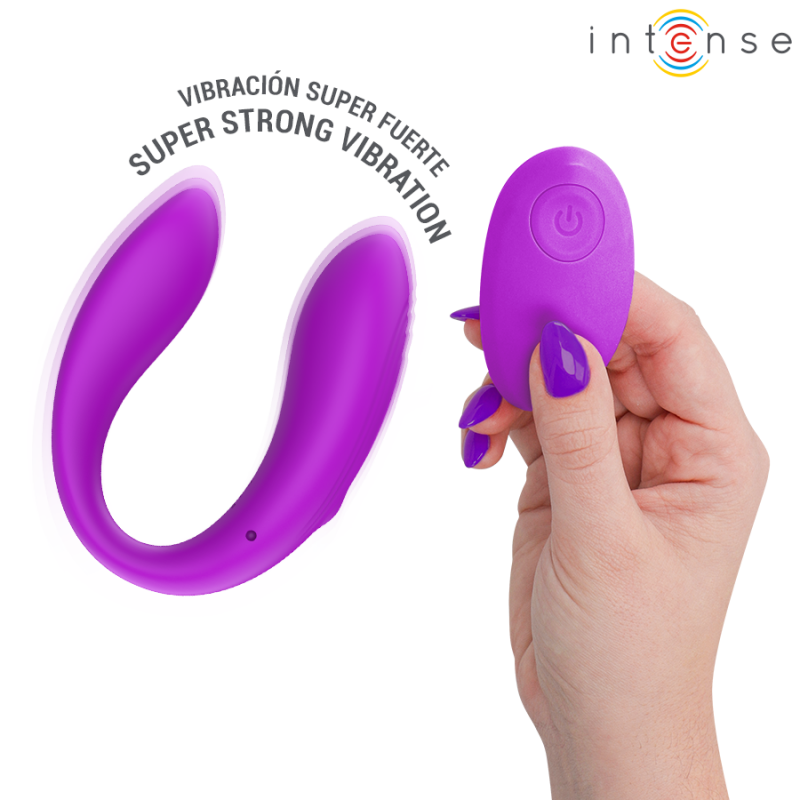img_223813_57e528cbb9a57cfe9535591a7b966bd9_1png - Sex Shop | Lodia.gr - 100% Διακριτική Και Παράδοση με courier της επιλογή σας Purple wireless vibrator with a curved U-shape and a handheld remote being held by a hand; Intense logo in the corner.