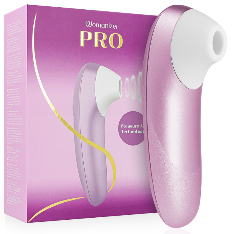 Pink Womanizer PRO sex toy with curved handle beside its purple packaging, designed for clitoral stimulation.