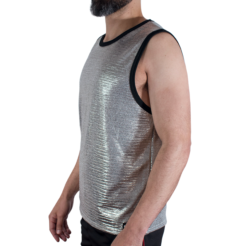 Man wearing a silver metallic sleeveless tank top, side view, black trim around neck and armholes.