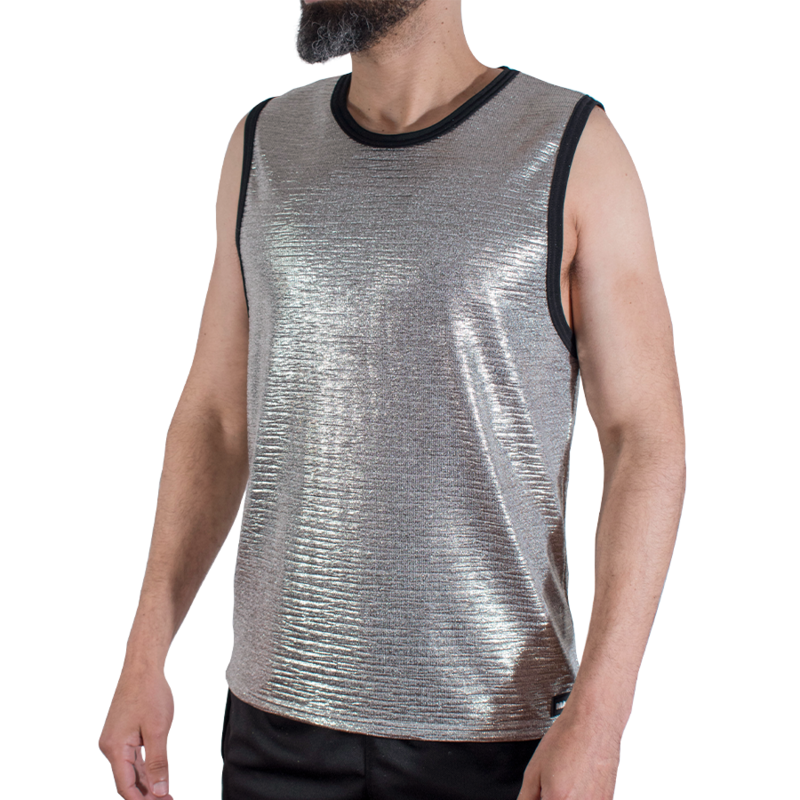 Man wearing a sleeveless metallic silver tank top with black trim, standing in a neutral pose
