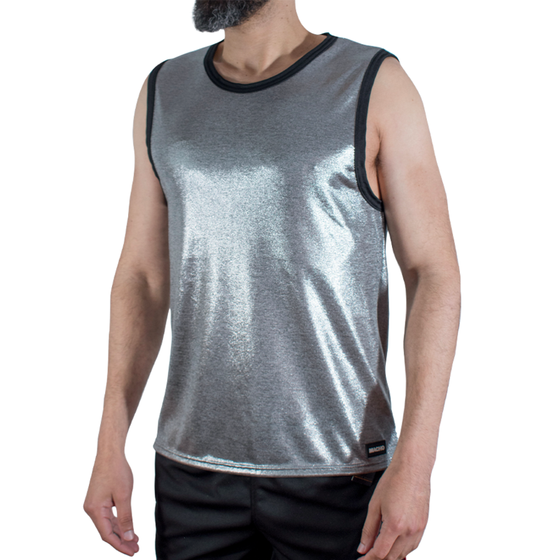 Man wearing a silver metallic sleeveless shirt with black trim, standing against a white background.