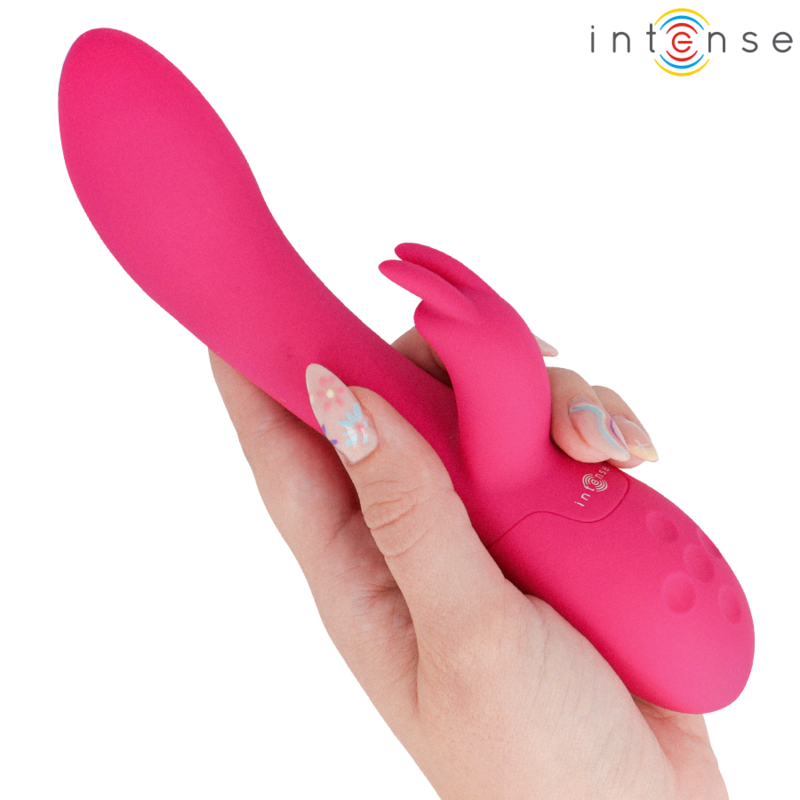 img_225751_2995c549cd5cc763b242e1ca1fa38cd7_1png - Sex Shop | Lodia.gr - 100% Διακριτική Και Παράδοση με courier της επιλογή σας Pink silicone vibrator with a curved shaft and a finger-friendly base being held in a hand, designed for sexual pleasure