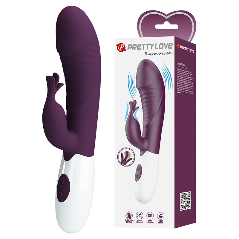 Purple silicone rabbit vibrator with white control base and dual-action shaft, shown beside its product box.