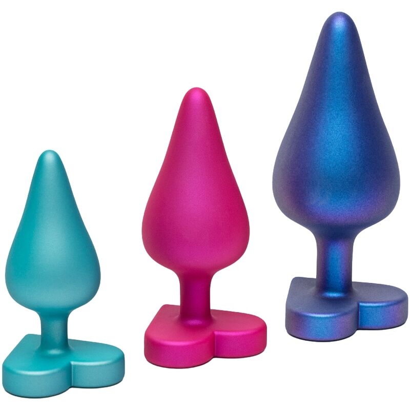 Three colorful anal butt plugs (teal, pink, and blue) arranged in a row on a white background.