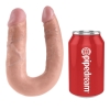 Pink curved dildo next to a red Pipedream can, showing a sex toy and branding.