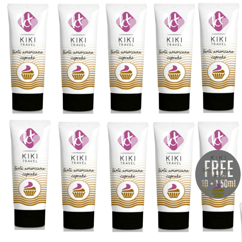 Row of white KIKI Travel cupcake packaging tubes arranged in a grid, with pink logo and a cupcake illustration accented by gold waves groove pattern on each tube