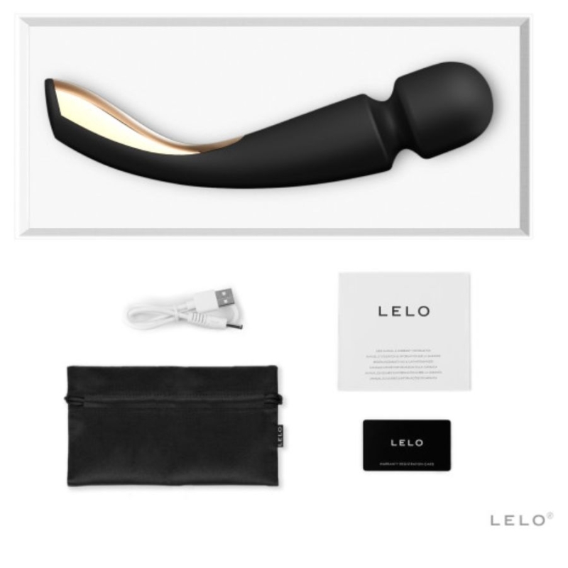 LELO wand massager kit displayed: black curved silicone massager with gold interior, USB charging cable, black pouch, instruction card, and a black LELO card on a white background