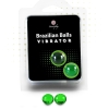 Packaging for 'Brazilian Balls Vibrator' with two green tactile balls outside the blister pack, branding 'Secret play' on black card