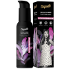 Black Coquette vegan water-based lubricant bottle with pink feather graphics, shown next to its black packaging box featuring a retro photo of a woman and a pink 'WOMAN SENSITIVE' label.